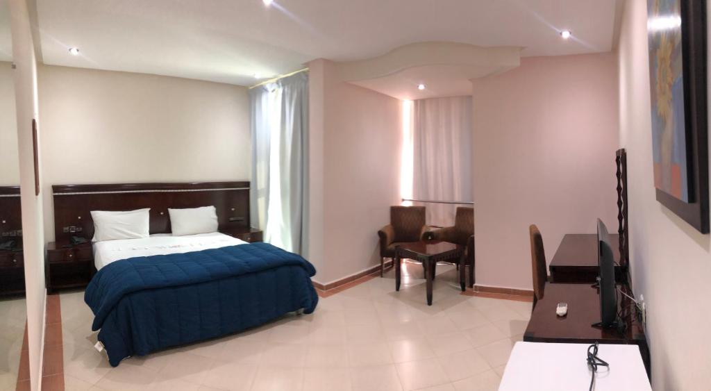 Postel nebo postele na pokoji v ubytování Dream's Hotel