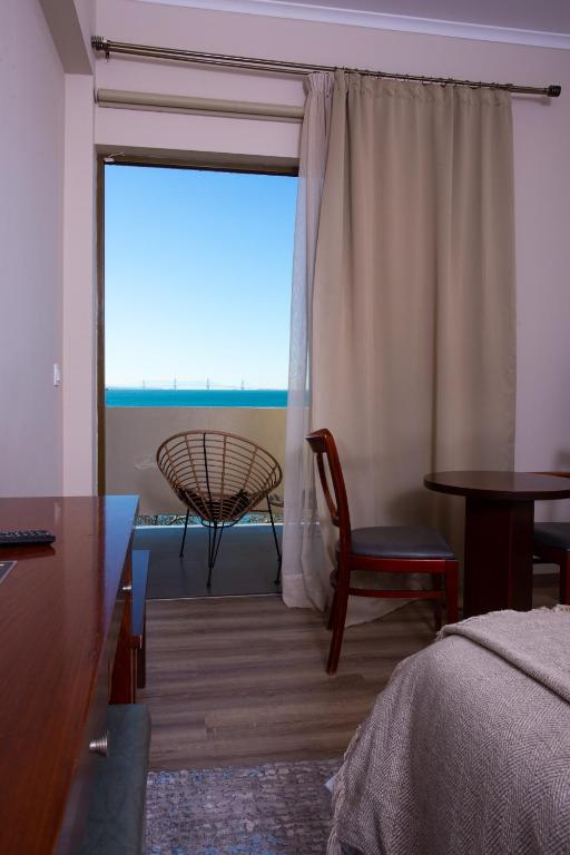Postel nebo postele na pokoji v ubytování LEPANTO BEACH HOTEL