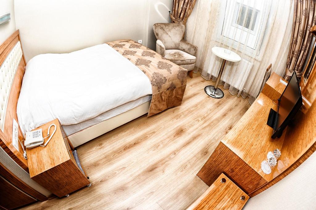 Postel nebo postele na pokoji v ubytování Serenti Pamuk Hotel