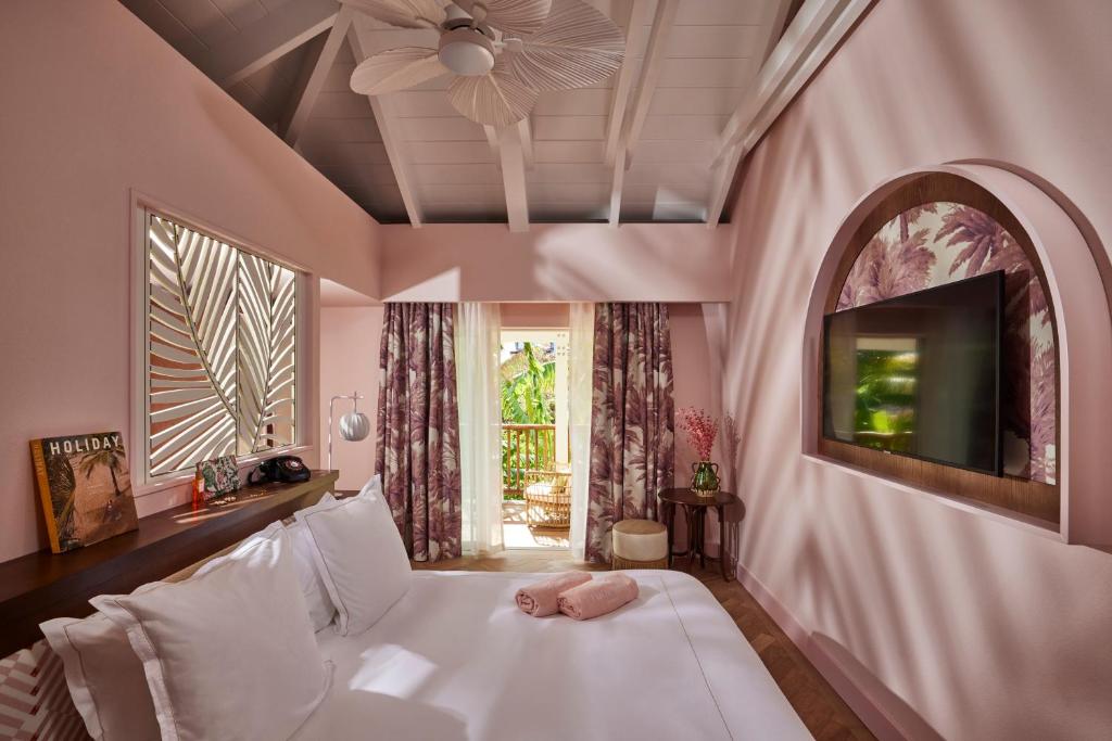 Postel nebo postele na pokoji v ubytování Tropical Hotel St Barth