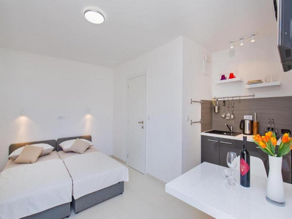 Posteľ alebo postele v izbe v ubytovaní Apartments St Thomas