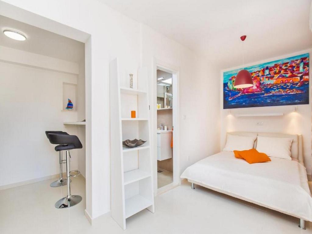 Posteľ alebo postele v izbe v ubytovaní Apartments St Thomas