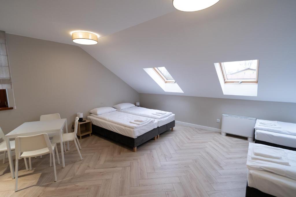 Pensjonat Dominikański - Chambre Quadruple Avec Salle De Bain
