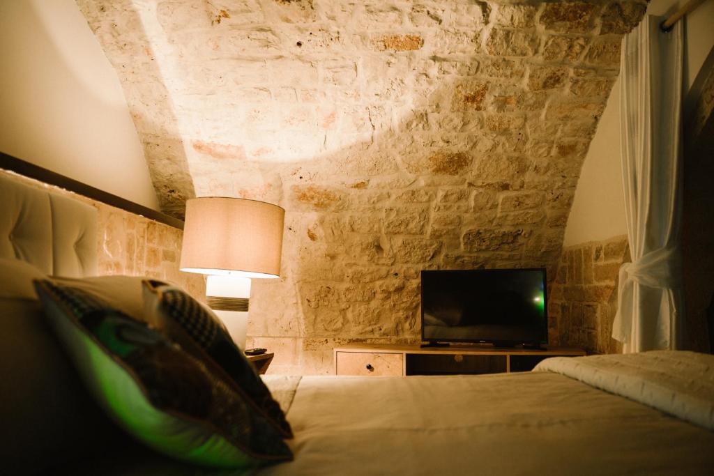 Postel nebo postele na pokoji v ubytování Apulia Suite