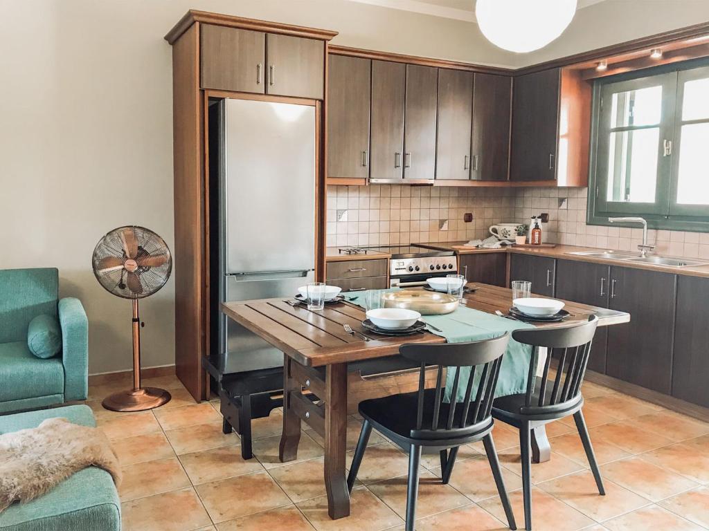 A kitchen or kitchenette at Agrilia Maison