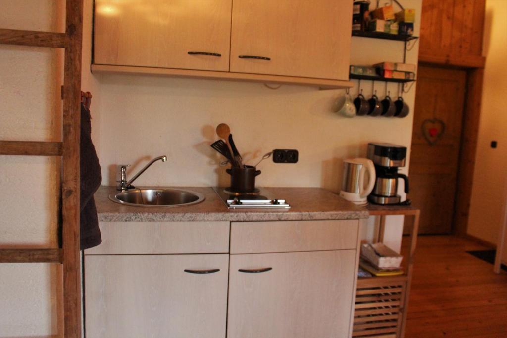 Kuchyň nebo kuchyňský kout v ubytování Moosmühle Allgäu