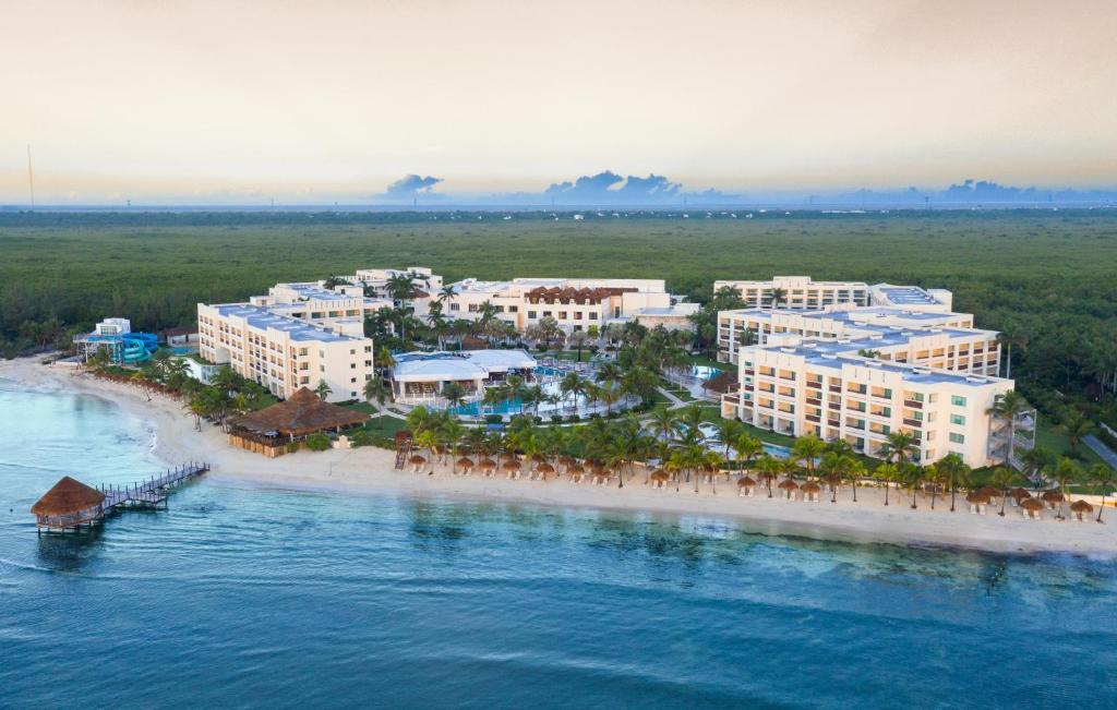 an aerial view of a resort on a beach at Hyatt Ziva Riviera Cancun All-Inclusive in Puerto Morelos
