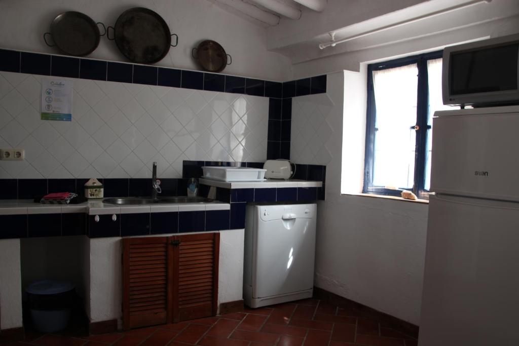 Kuchyň nebo kuchyňský kout v ubytování Casa de Familia Cortijo La Cubertilla