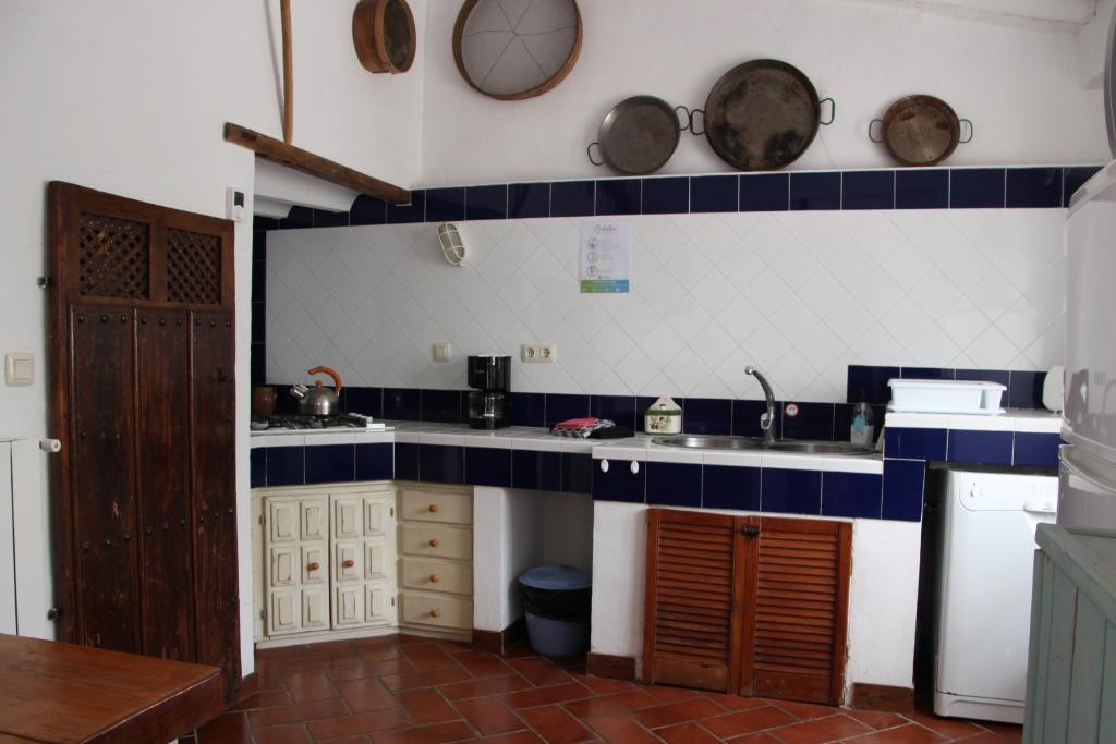 Kuchyň nebo kuchyňský kout v ubytování Casa de Familia Cortijo La Cubertilla