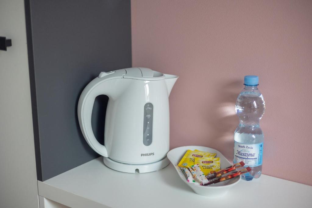 Príslušenstvo na prípravu kávy alebo čaju v ubytovaní ĄĘ Hostel Nowy Świat
