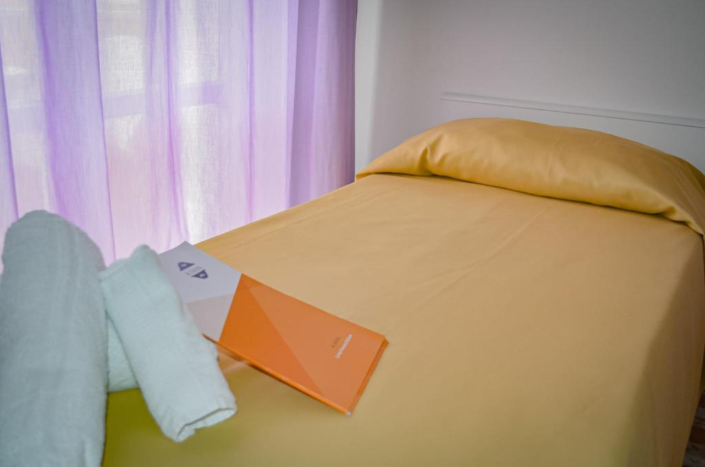 Postel nebo postele na pokoji v ubytování Hotel Stradiot