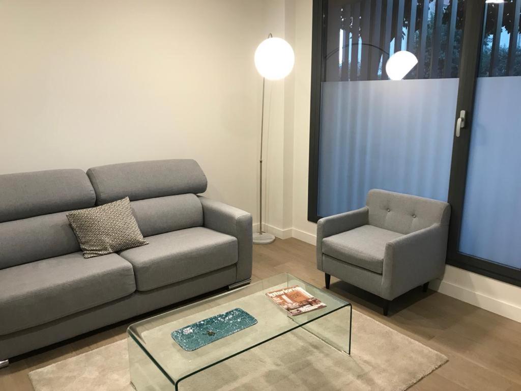 Posezení v ubytování Apartamento de dos dormitorios en Triana