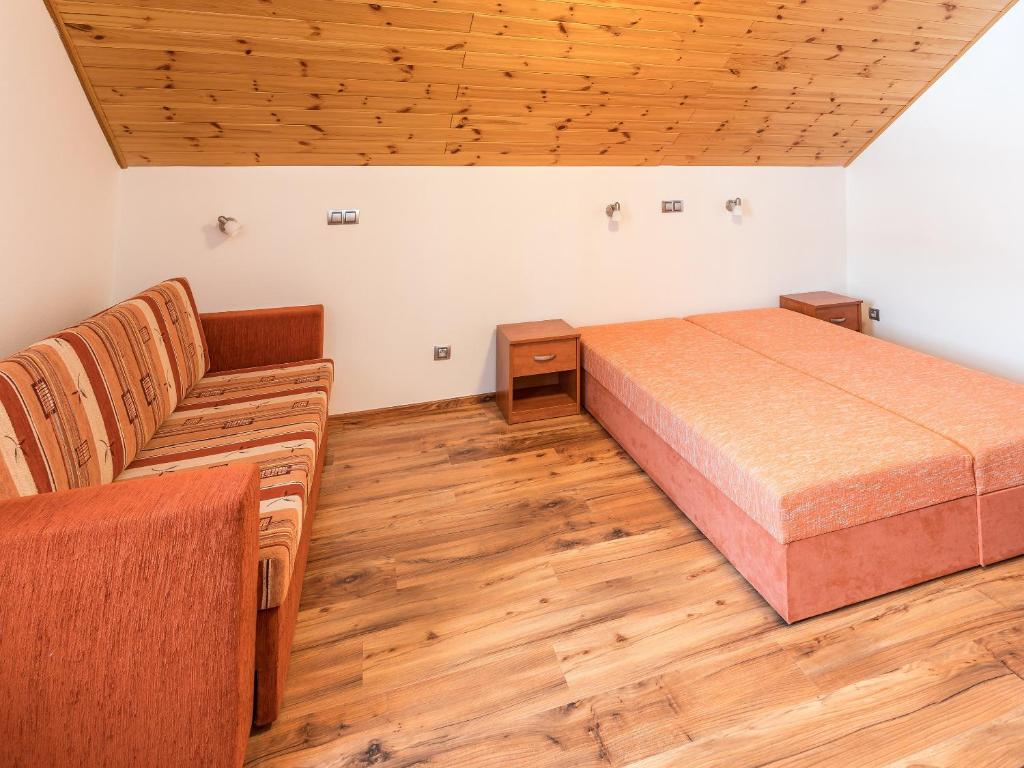 Postel nebo postele na pokoji v ubytování EA Apartmány na Filipce