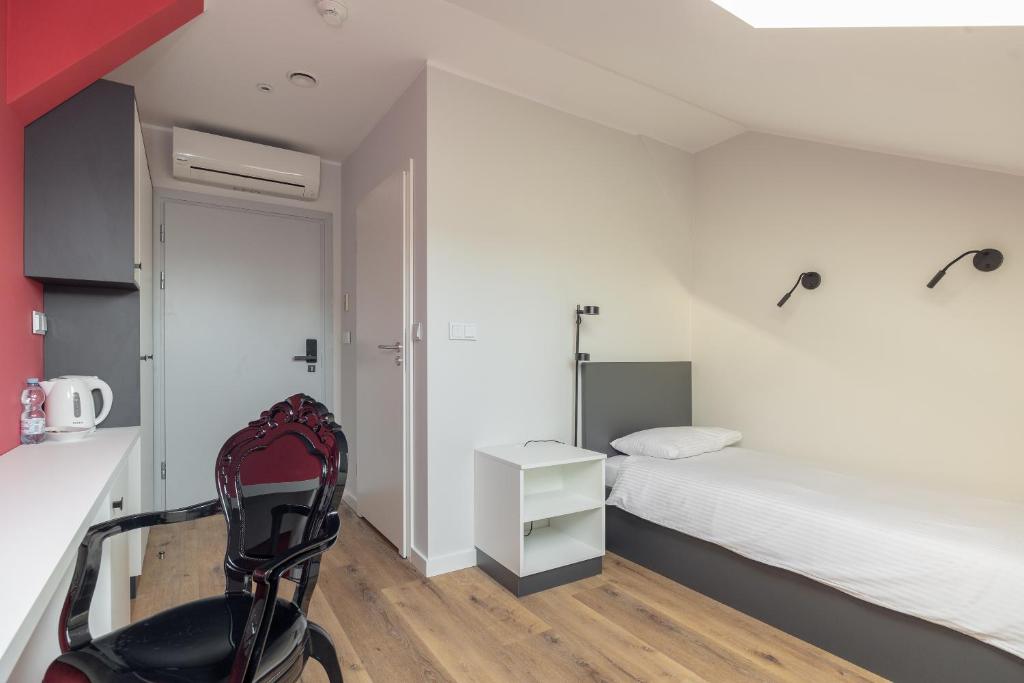 Posteľ alebo postele v izbe v ubytovaní ĄĘ Hostel Nowy Świat