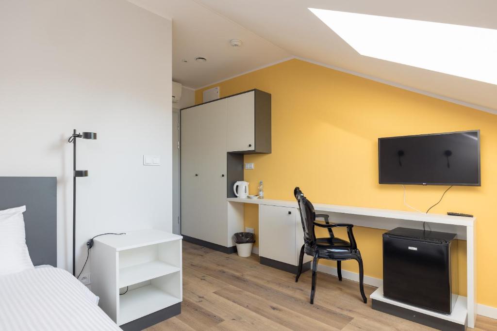 Kuchyňa alebo kuchynka v ubytovaní ĄĘ Hostel Nowy Świat