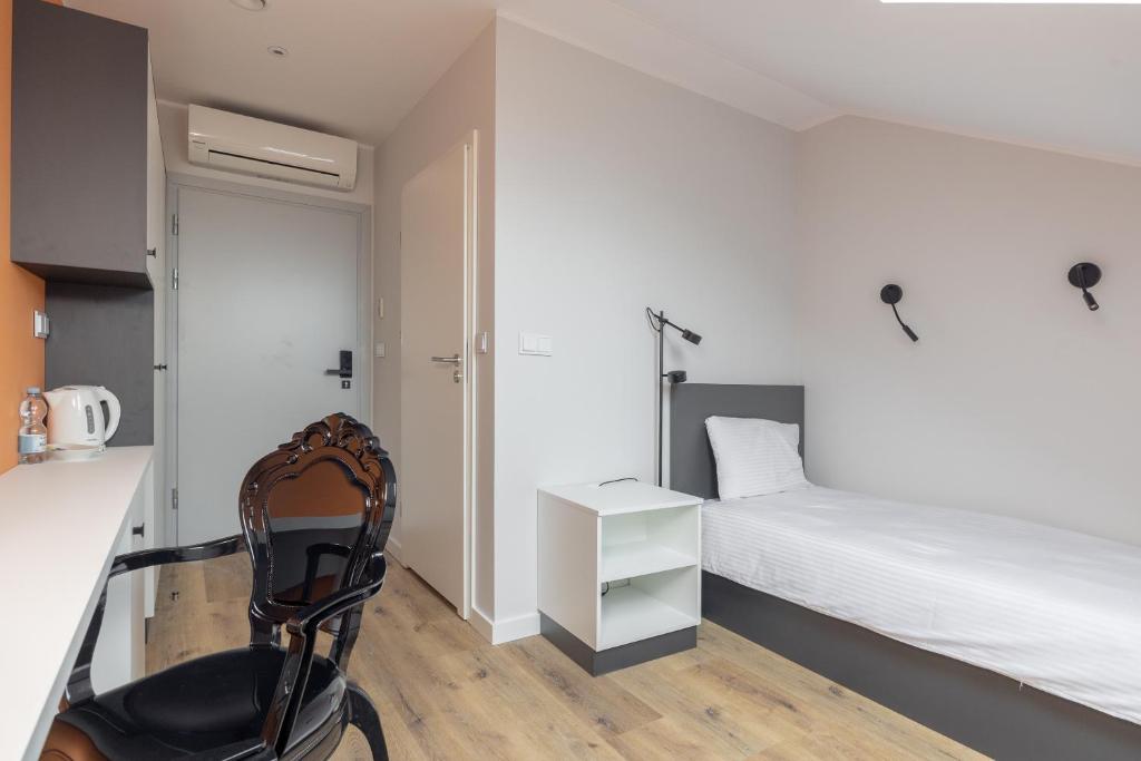 Posteľ alebo postele v izbe v ubytovaní ĄĘ Hostel Nowy Świat