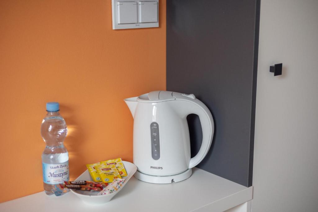 Príslušenstvo na prípravu kávy alebo čaju v ubytovaní ĄĘ Hostel Nowy Świat