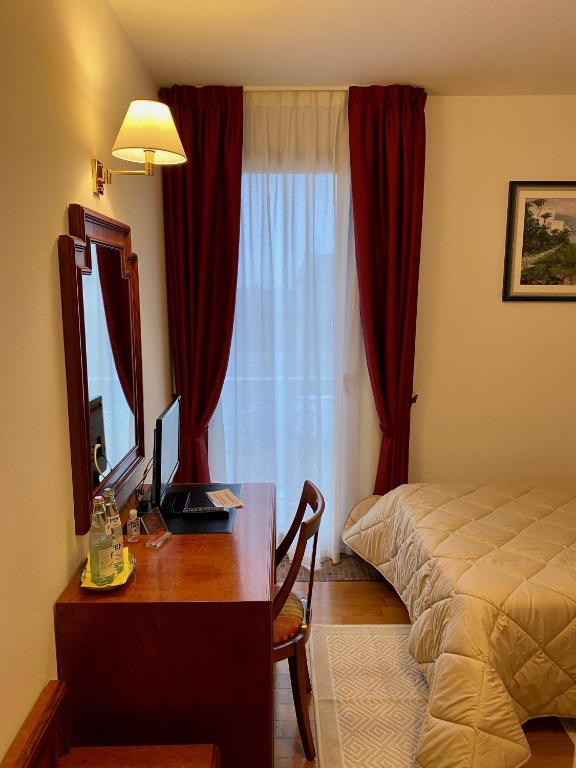 Postel nebo postele na pokoji v ubytování Hotel Fuori Città