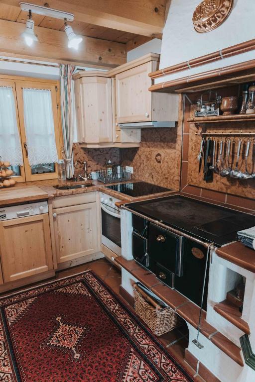 Kuchyň nebo kuchyňský kout v ubytování Haus in den Bergen