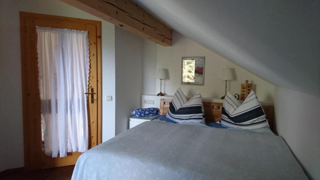 Postel nebo postele na pokoji v ubytování Haus in den Bergen