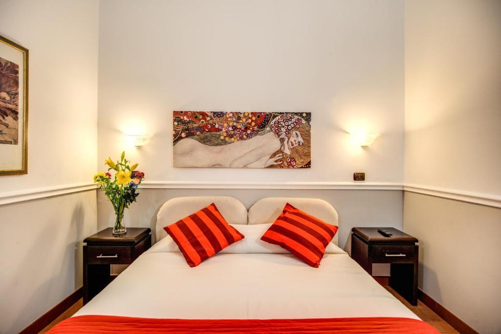Postel nebo postele na pokoji v ubytování Hotel Everest Inn Rome