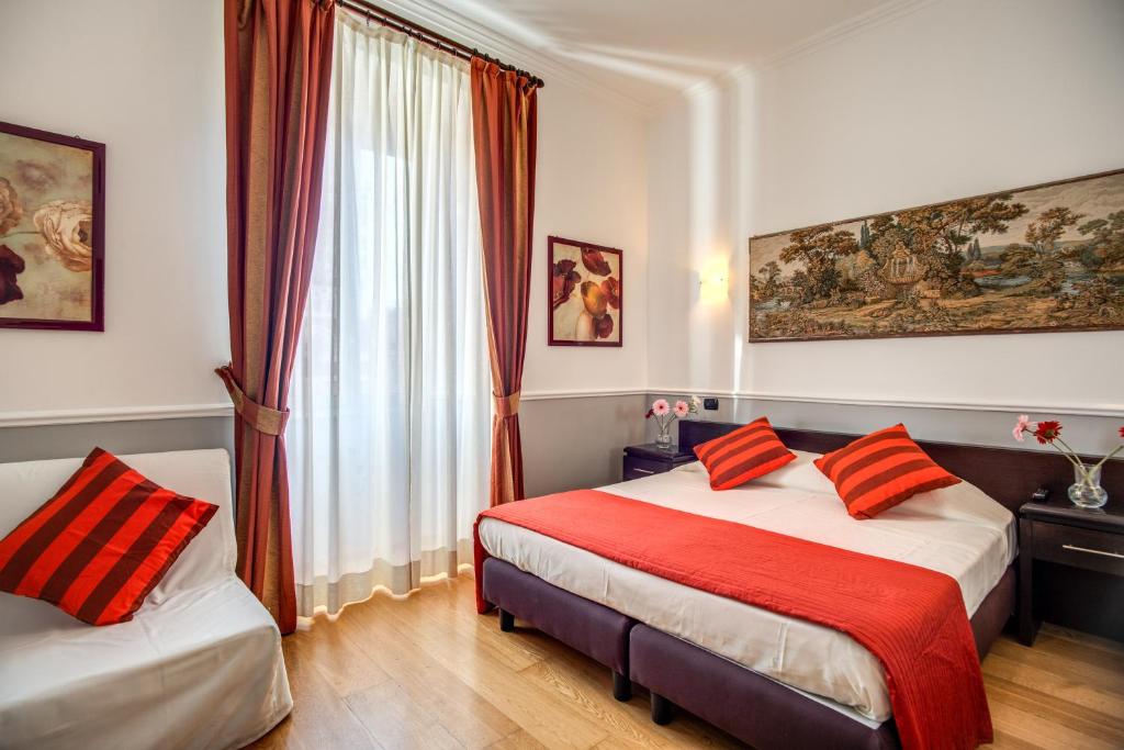 Postel nebo postele na pokoji v ubytování Hotel Everest Inn Rome