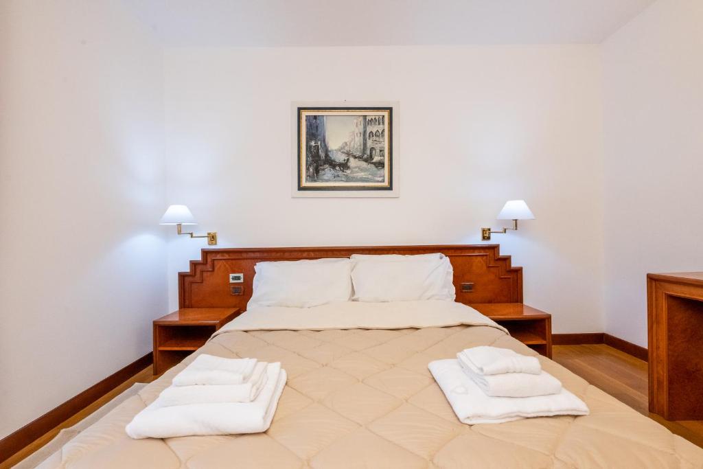 Postel nebo postele na pokoji v ubytování Hotel Fuori Città