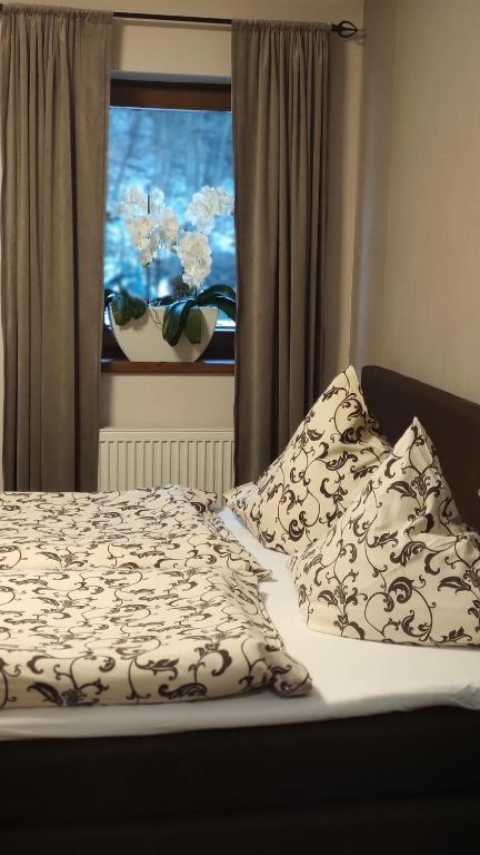 Postel nebo postele na pokoji v ubytování Margus Apartmány