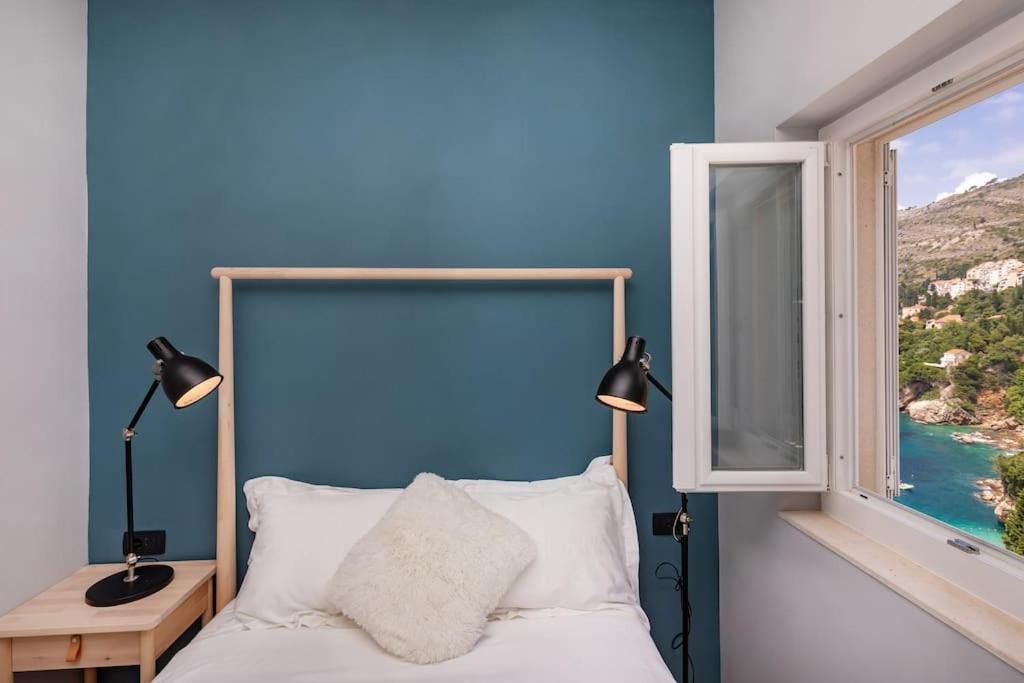 Posteľ alebo postele v izbe v ubytovaní St Jakov Superior Beach Apartment with Free Parking