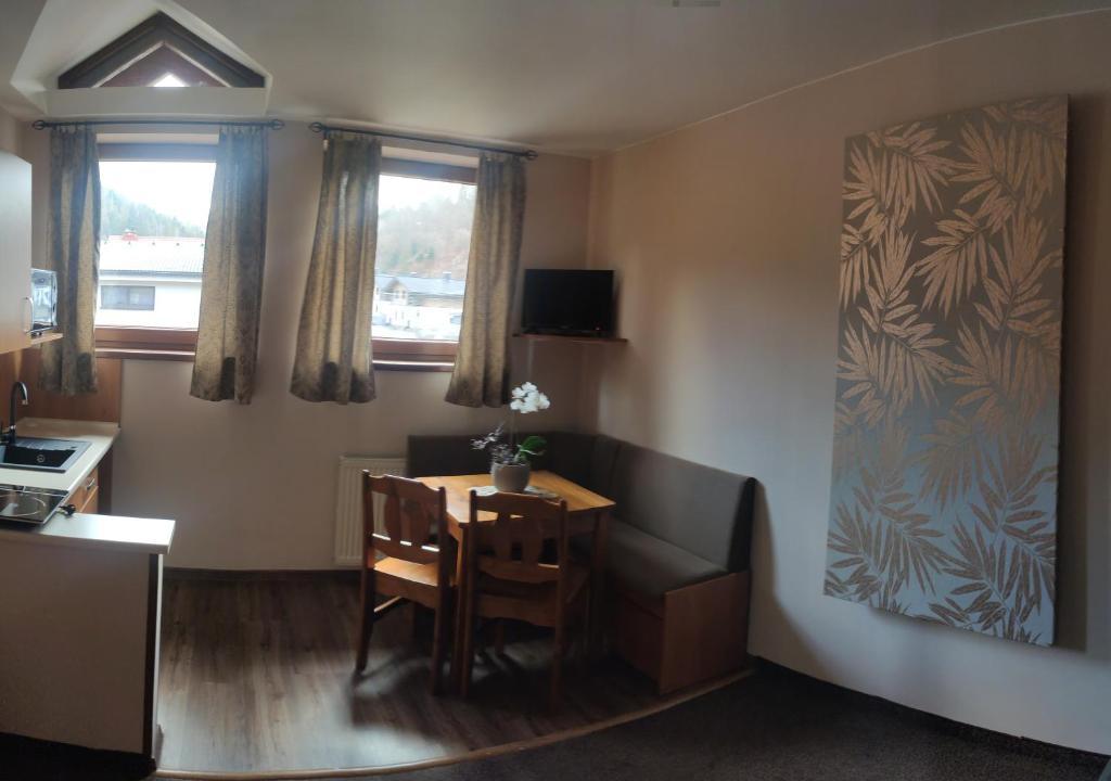 TV a/nebo společenská místnost v ubytování Margus Apartmány