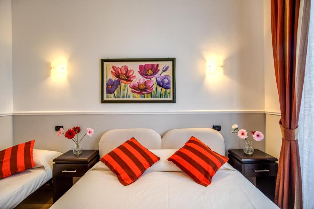 Postel nebo postele na pokoji v ubytování Hotel Everest Inn Rome