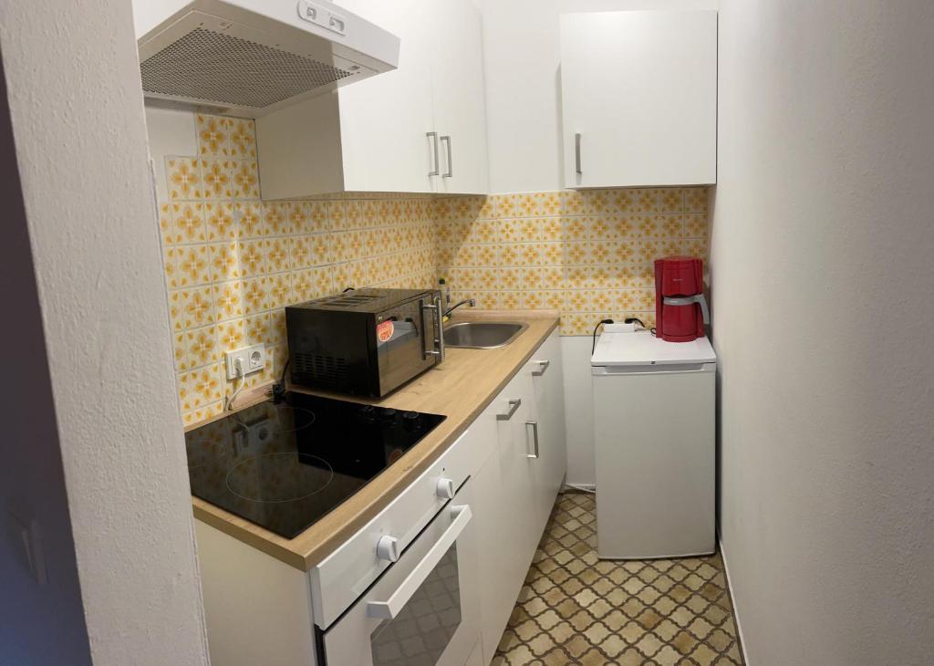 Kuchyň nebo kuchyňský kout v ubytování Hotel Löwen