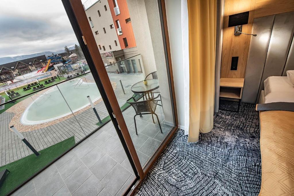 Posteľ alebo postele v izbe v ubytovaní Apartmán Drahokam Bešeňová