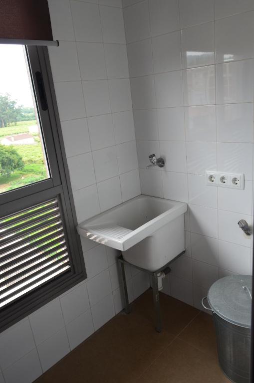 Koupelna v ubytování Dúplex con encanto en Ribadumia, incluye garaje