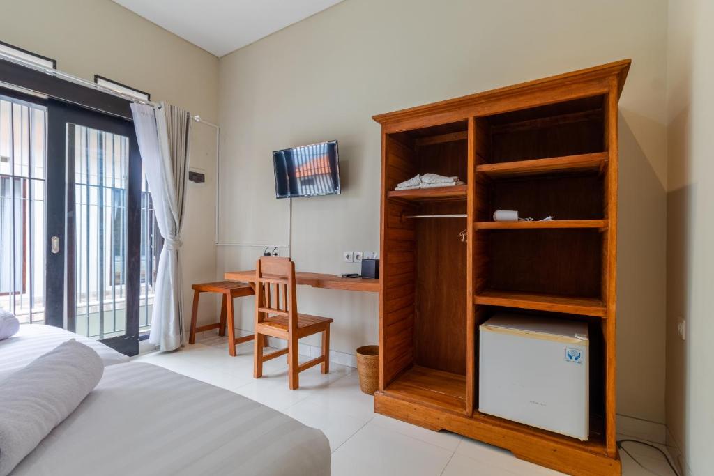 Postel nebo postele na pokoji v ubytování Josh Guest House