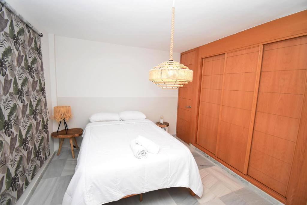 Postel nebo postele na pokoji v ubytování Expoholidays - Apartamentos Puerto Almerimar