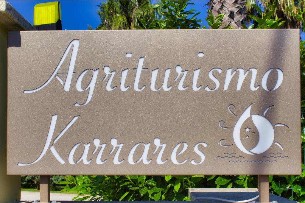 a sign for a kahuna kahles at Agriturismo Karrares in Melendugno