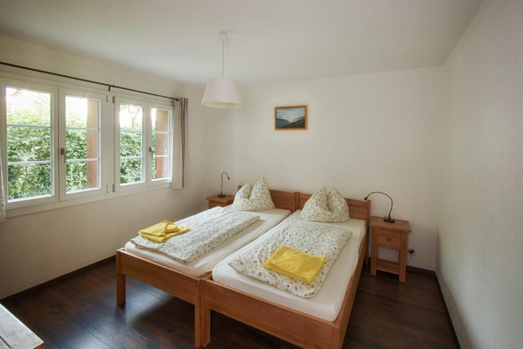 Postel nebo postele na pokoji v ubytování CityChalet