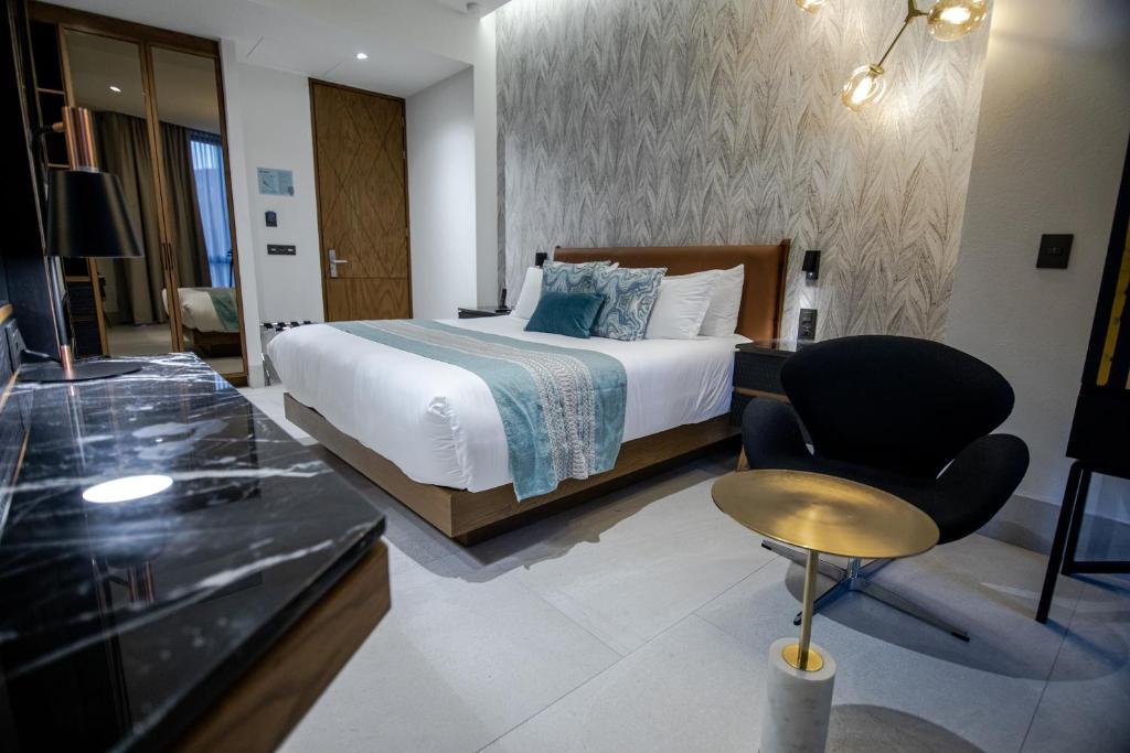 Postel nebo postele na pokoji v ubytování Becquer Hotel Guadalajara