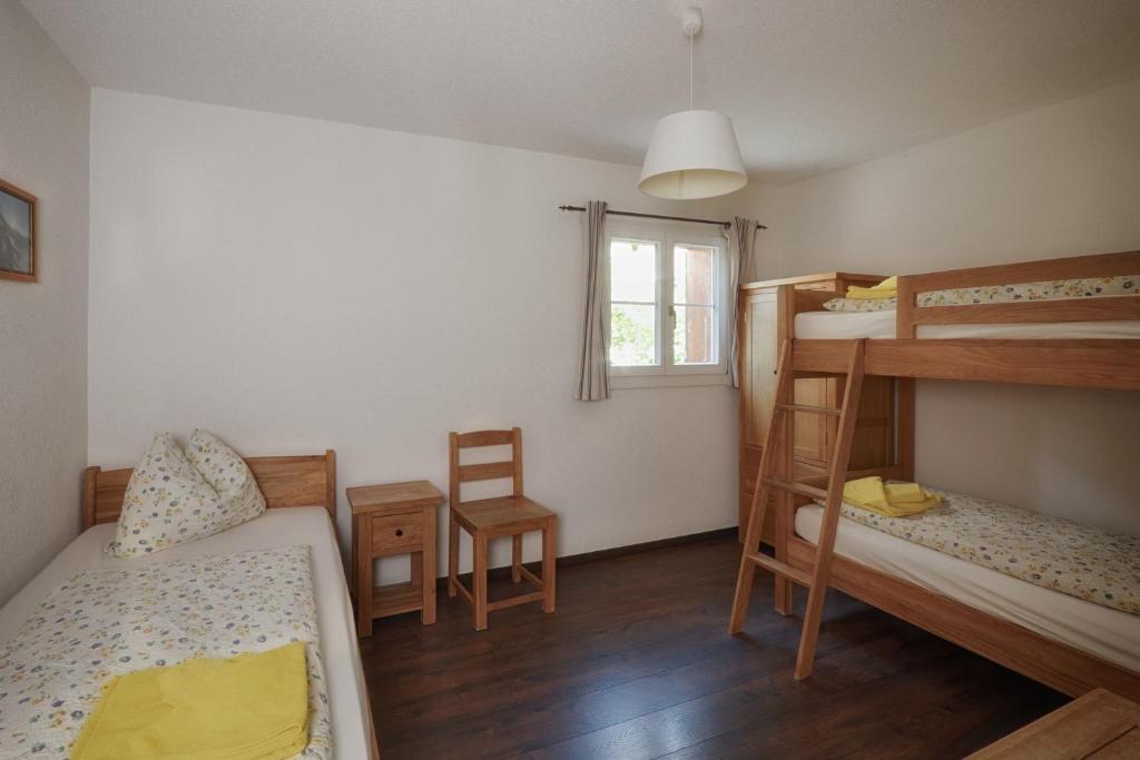 Postel nebo postele na pokoji v ubytování CityChalet