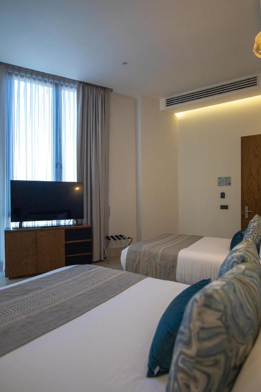 Postel nebo postele na pokoji v ubytování Becquer Hotel Guadalajara