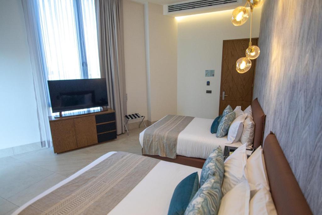 TV a/nebo společenská místnost v ubytování Becquer Hotel Guadalajara