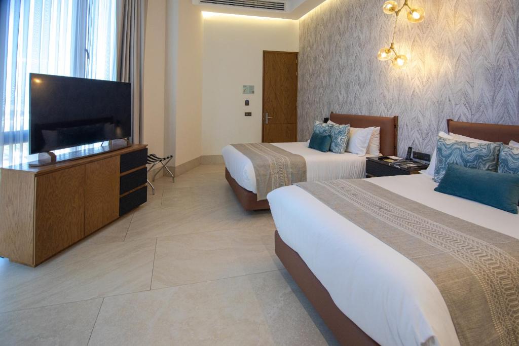 TV a/nebo společenská místnost v ubytování Becquer Hotel Guadalajara