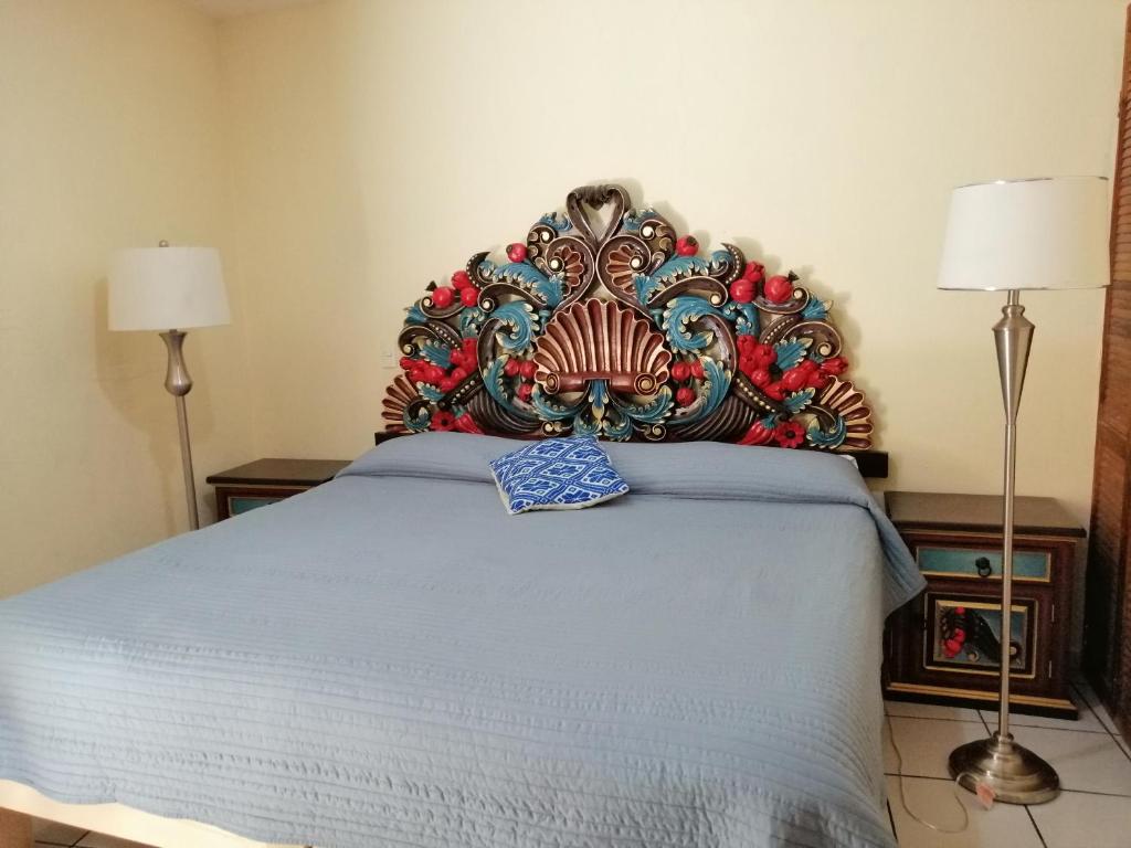 Postel nebo postele na pokoji v ubytování Hotel Chely