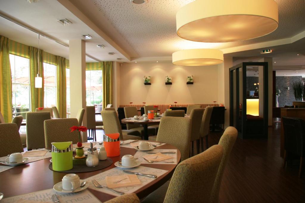 Posezení v ubytování NordWest-Hotel Bad Zwischenahn