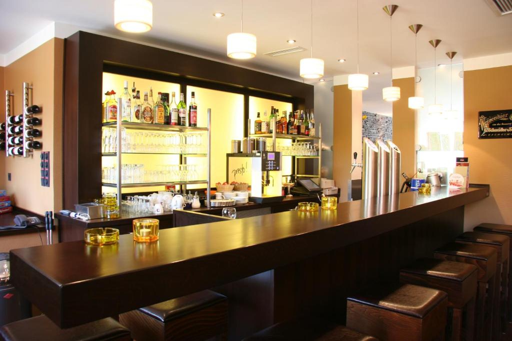 Lounge nebo bar v ubytování NordWest-Hotel Bad Zwischenahn