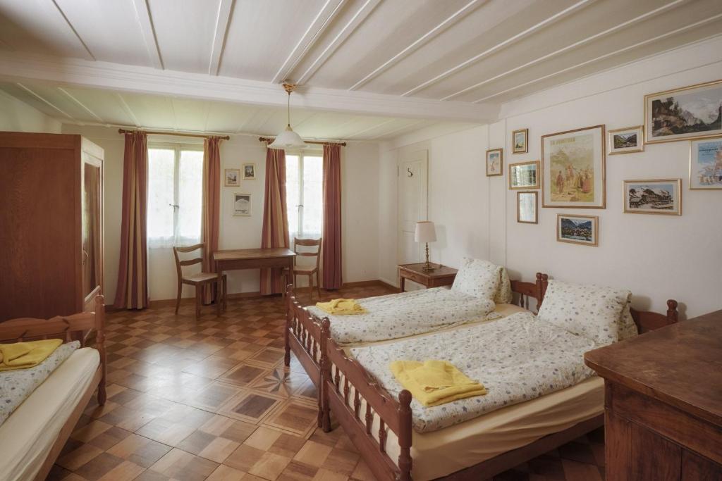 Postel nebo postele na pokoji v ubytování CityChalet historic