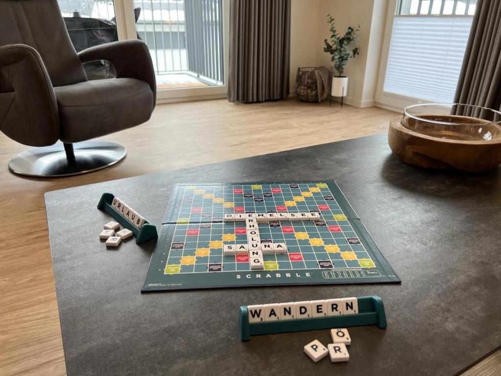 a chess game on a table in a living room at Sonnenweg 44-6 in Heringhausen