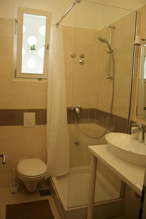 Koupelna v ubytování Lovely apartment in old part of Vis