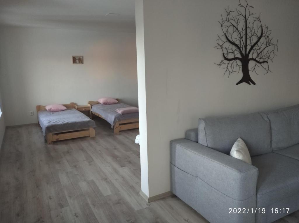 Postel nebo postele na pokoji v ubytování Penzion Tvrz Dub u Tábora